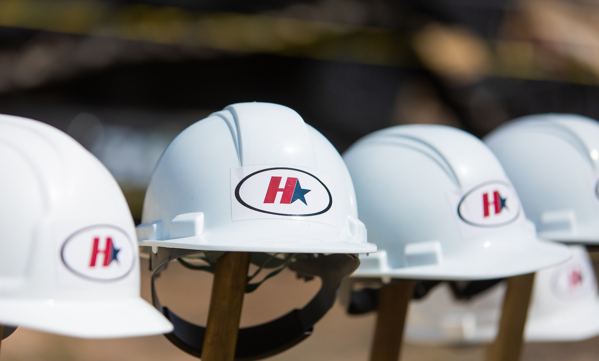 Photo of hard hats with Hutto City Logo