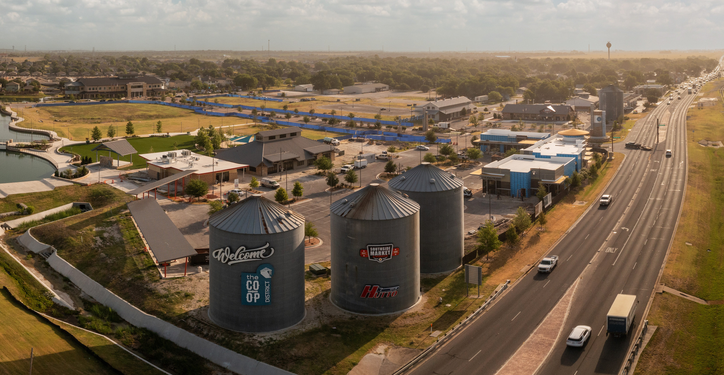 Aerial of water towers with downtown in the background