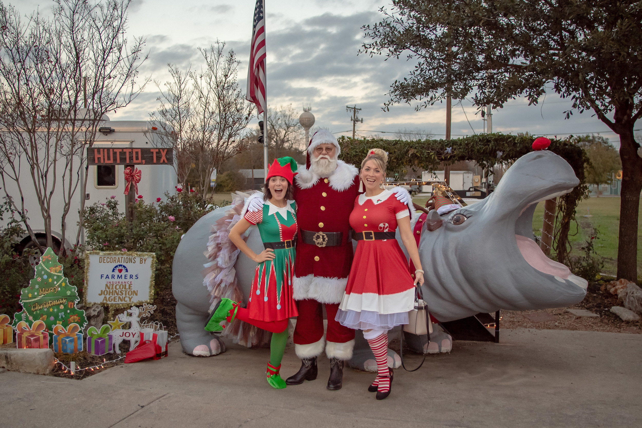 Elves with Santa in front of the Hutto hippo